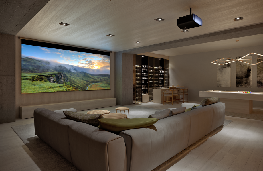 Luxurious home theater with a large projector screen, sophisticated interior design and a cozy seating arrangement.
